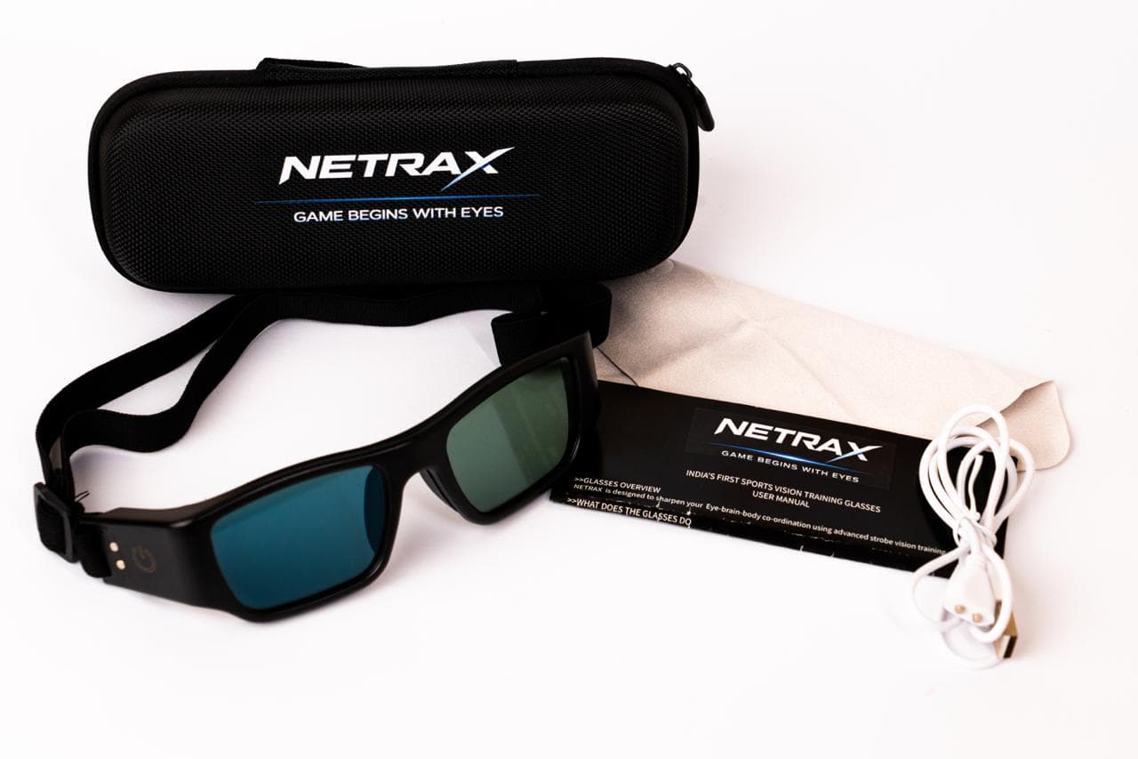 Netrax glasses with case, cable, cloth, and manual